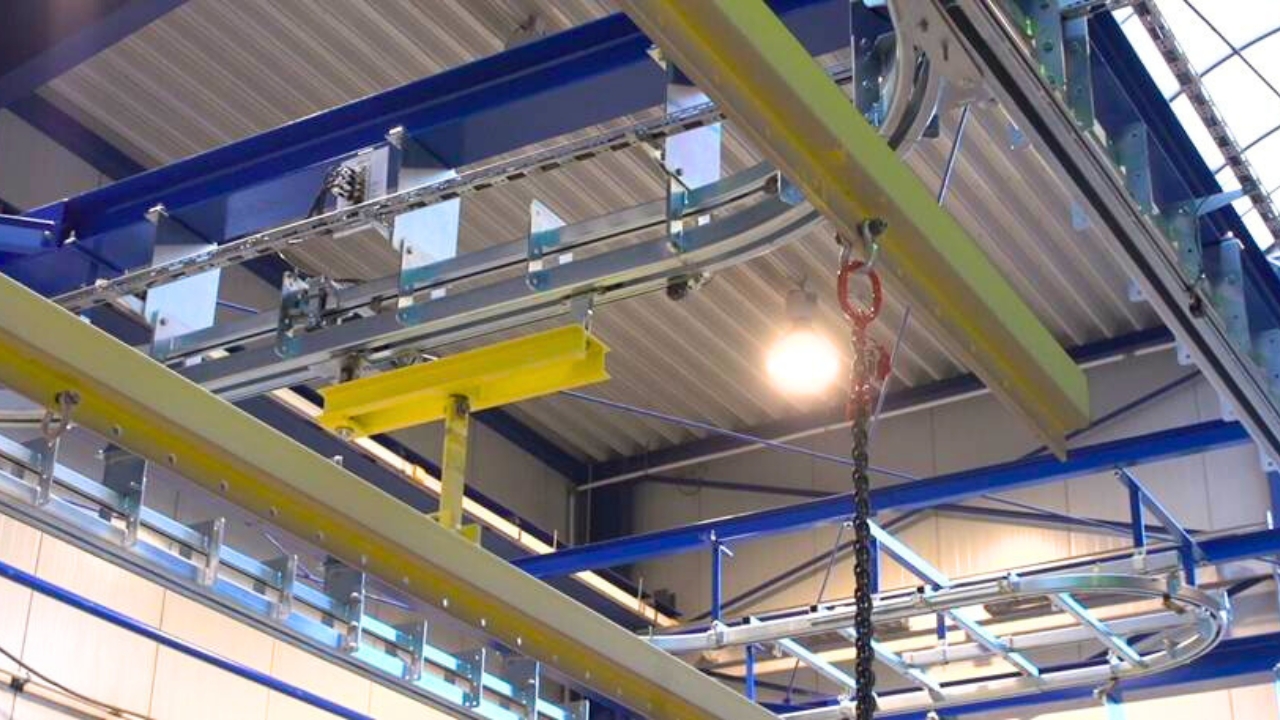 Power- and Freefördersystem für einen automatisierte Werkstücktransport